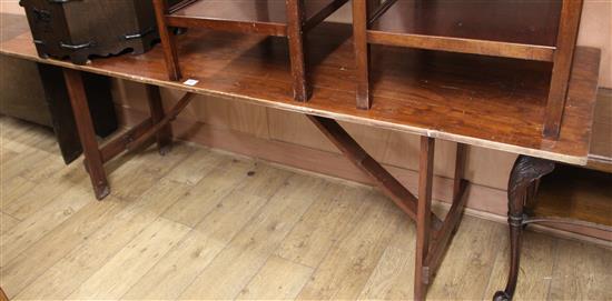 Stained pine tressel table W.228cm